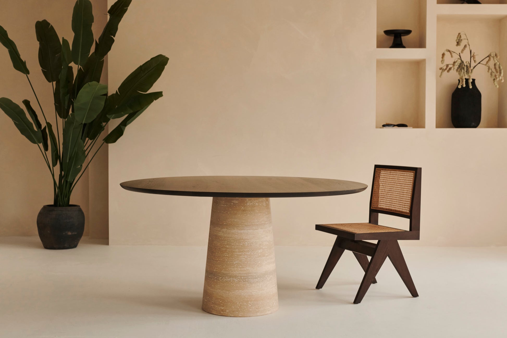 FLOW round dining table - Charcoal oak (travertin cylinder)