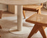travertin eettafel met beige middenpoot