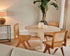 travertin eettafel met beige middenpoot