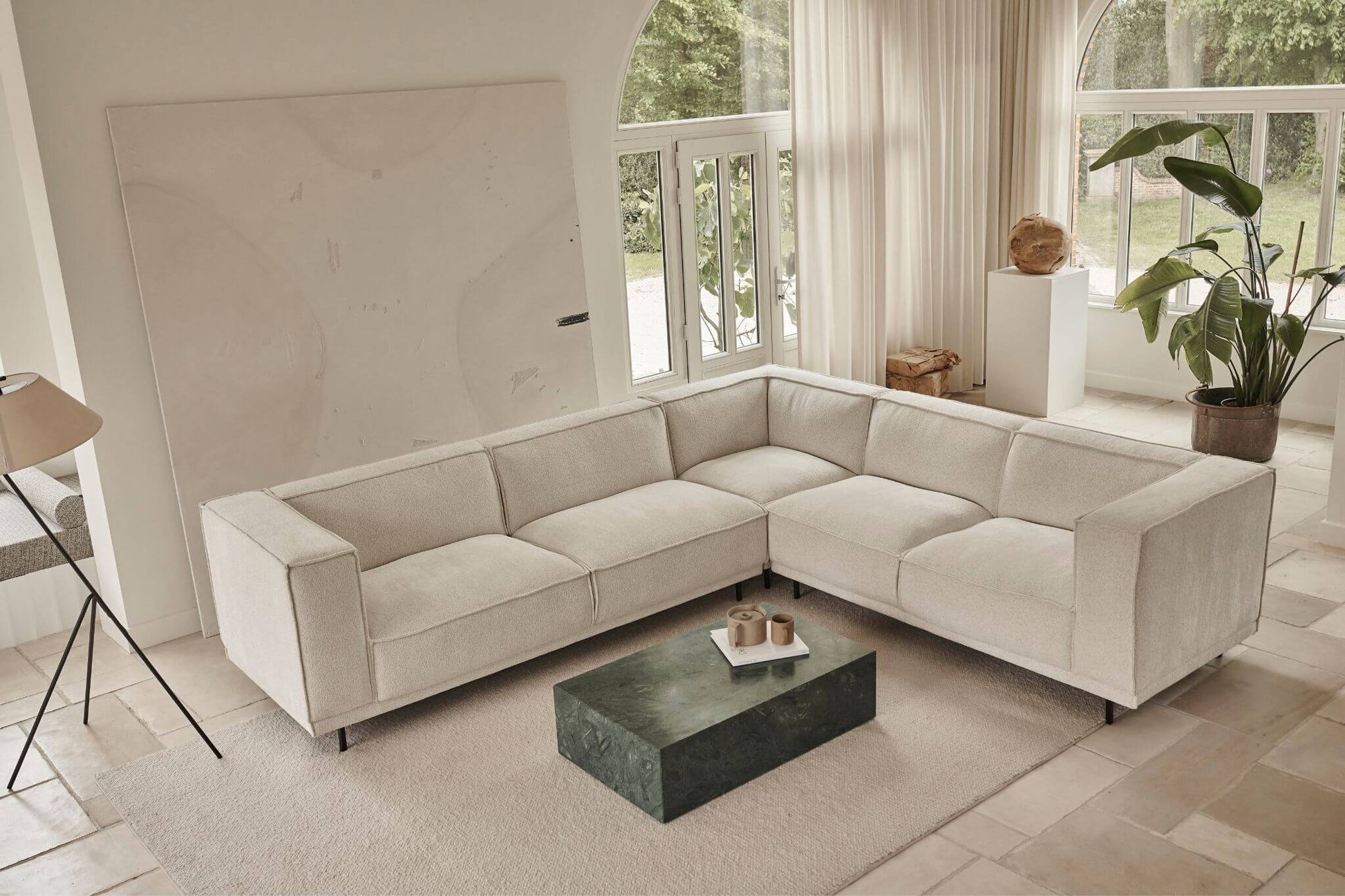 A beige Crema Marfil marble block coffee table by Aime Té with matte finish, measuring 100x60x27 cm.