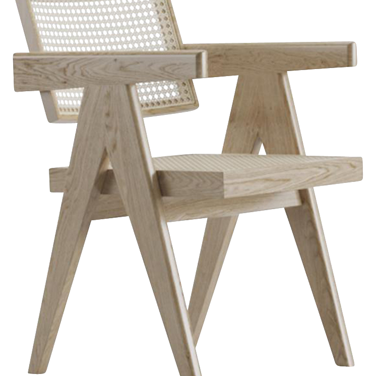 Natural rattan dining chair named Pierre by Aime Té featuring a woven rattan seat and backrest in a stylish, modern design.