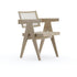 Rattan Pierre dining chair by Aime Té with natural finish, showcasing woven rattan seat and elegant curved design.