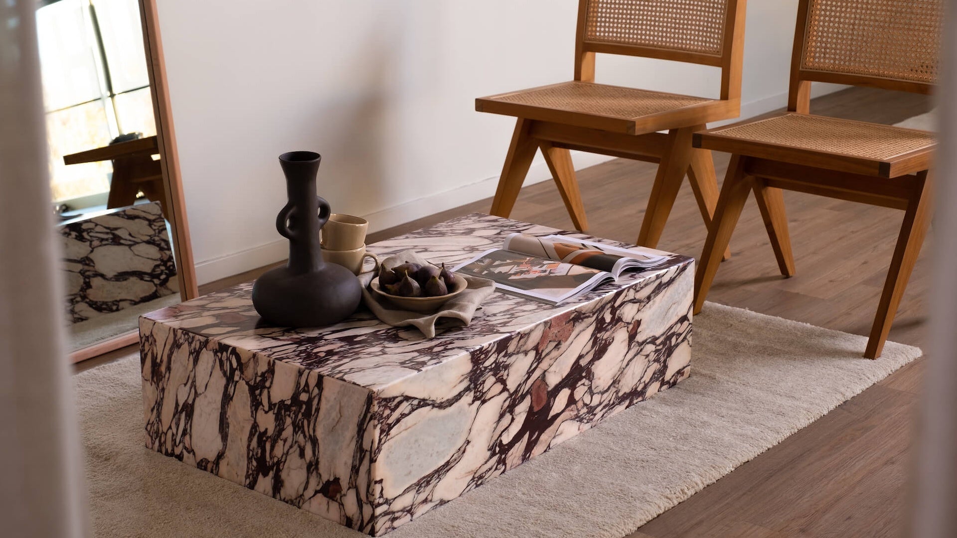 Marble block coffee table with matte Calacatta Viola marble surface and sturdy base, modern design for living room decor.