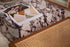 Matte Calacatta Viola marble block coffee table with rectangular shape and natural veining, measuring 100x60x27 cm.