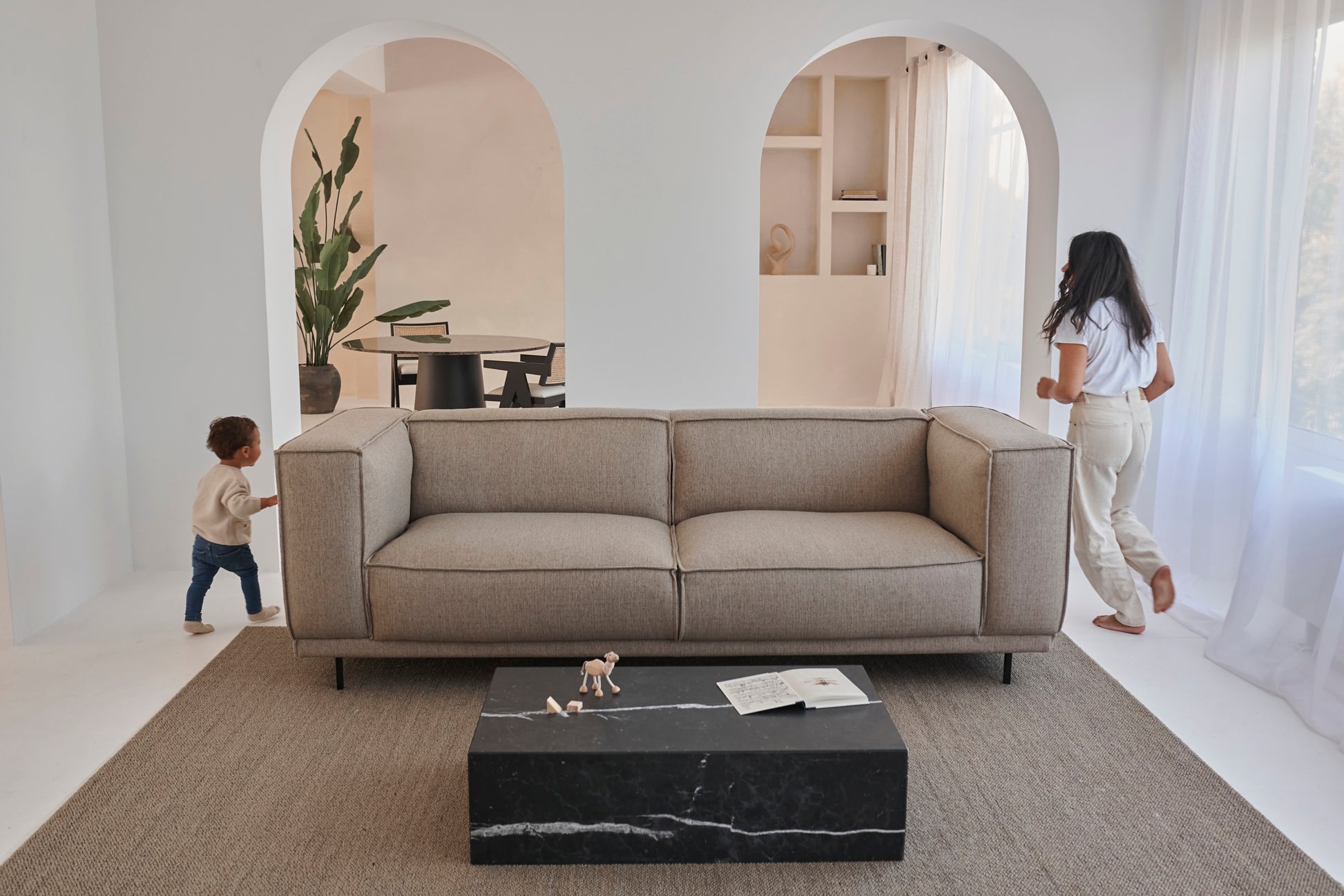 Marble block coffee table with matte Nero Marquina black marble, rectangular shape, smooth surface, modern design.