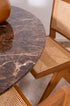 Dark Emperador brown round marble dining table with arch-style base, featuring a smooth marble surface and elegant design.