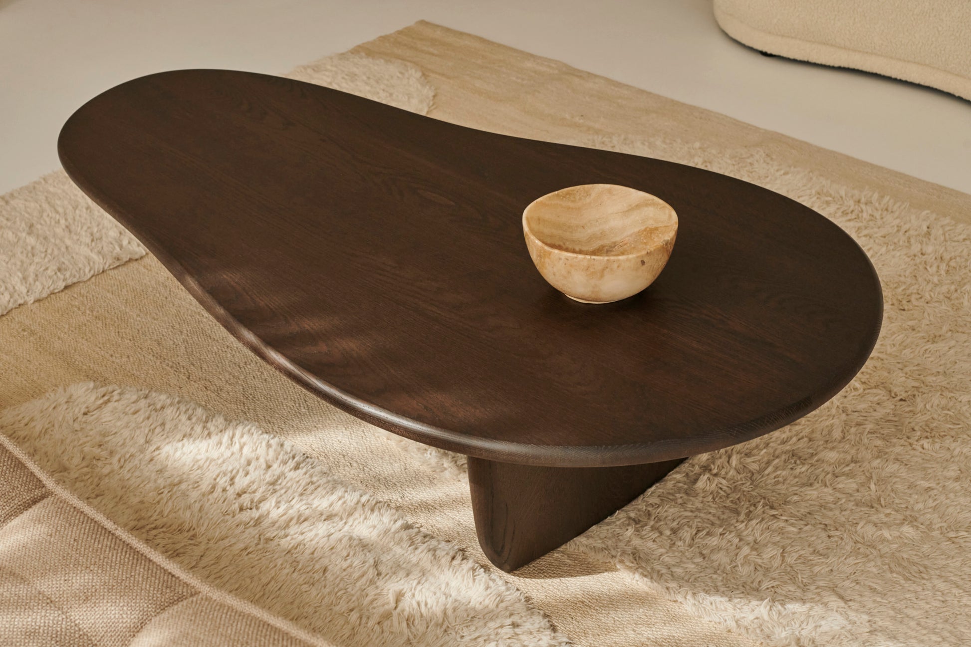 Natural wood FORM coffee table by My Store, rectangular with sturdy legs, showcasing a sleek modern design.