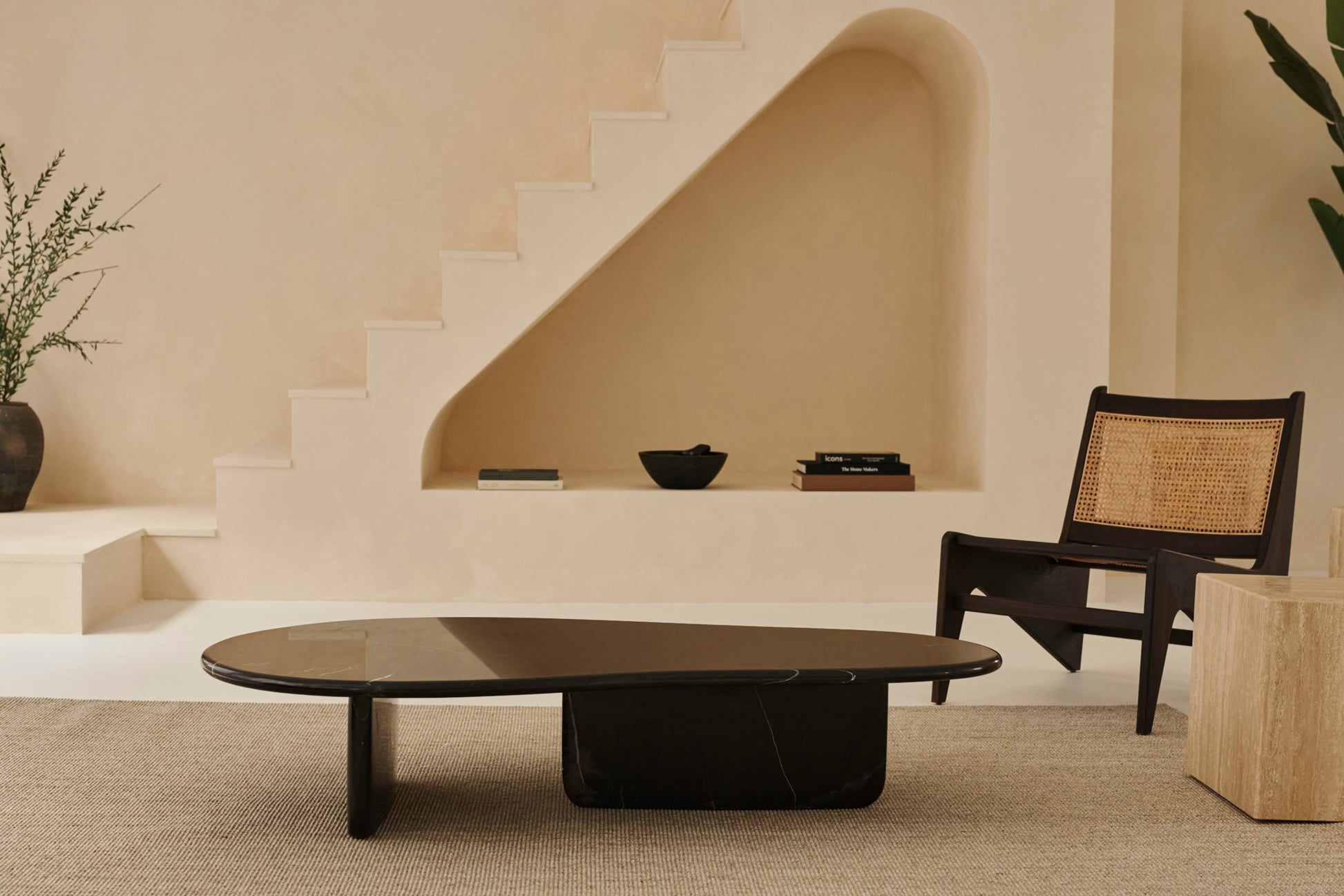 Form coffee table in Nero Marquina marble with sleek black finish, rectangular shape, and modern design.