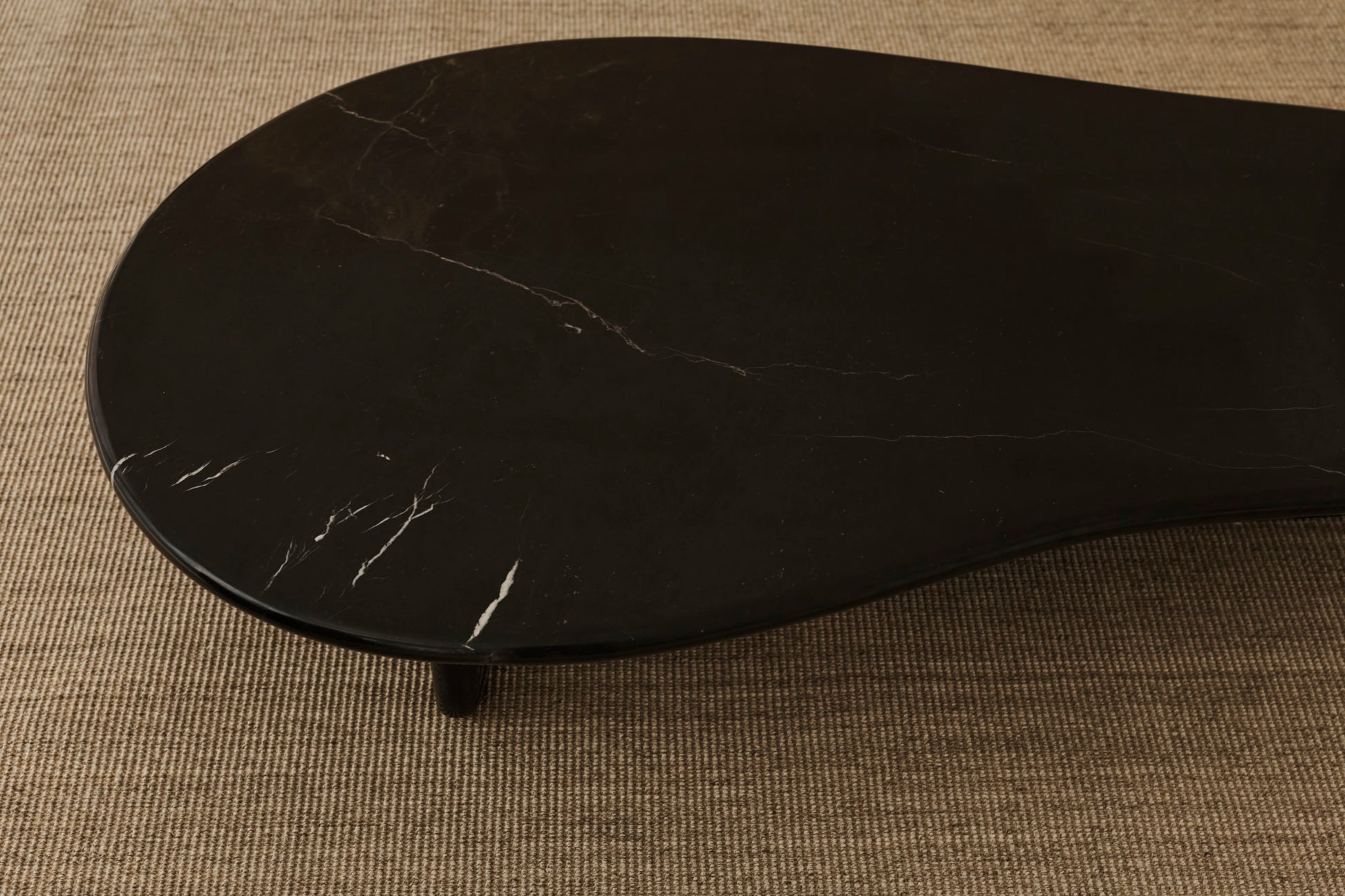 Form coffee table in Nero Marquina marble with sleek black finish, rectangular shape, and modern design.