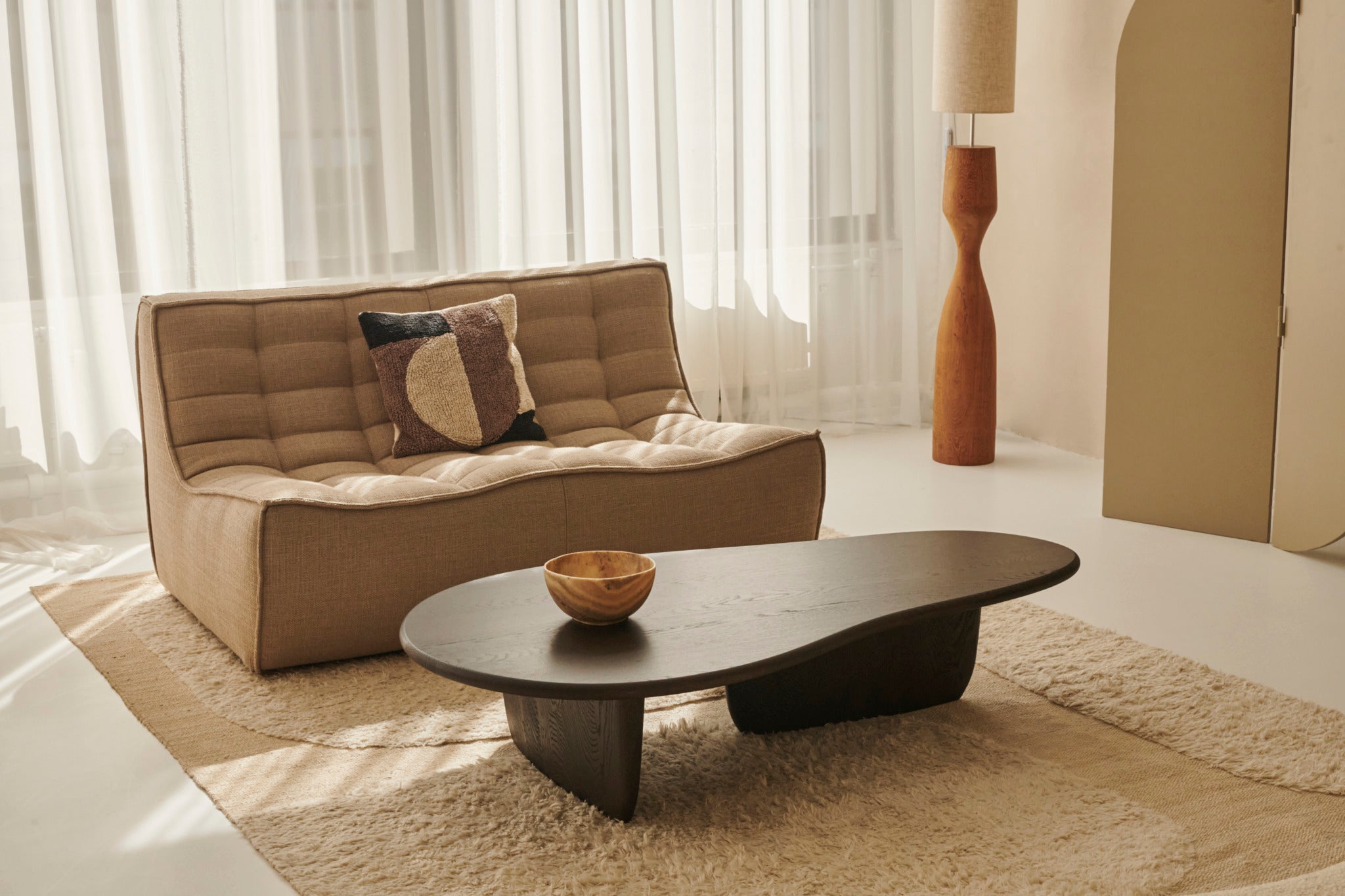 Smoked FORM coffee table by My Store with sleek glass top and black metal frame, measuring 120x66 cm.