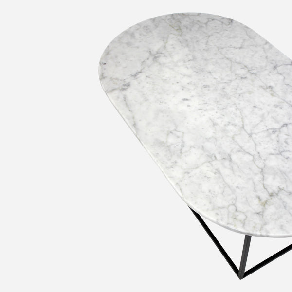 Glossy oval marble coffee table in Bianco Carrara white with a sleek design, perfect for modern living spaces.