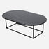 Glossy oval marble coffee table in Nero Marquina black with sleek, modern design and smooth surface.