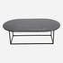 Glossy oval Nero Marquina black marble coffee table with sleek design, featuring a polished surface and modern aesthetic.