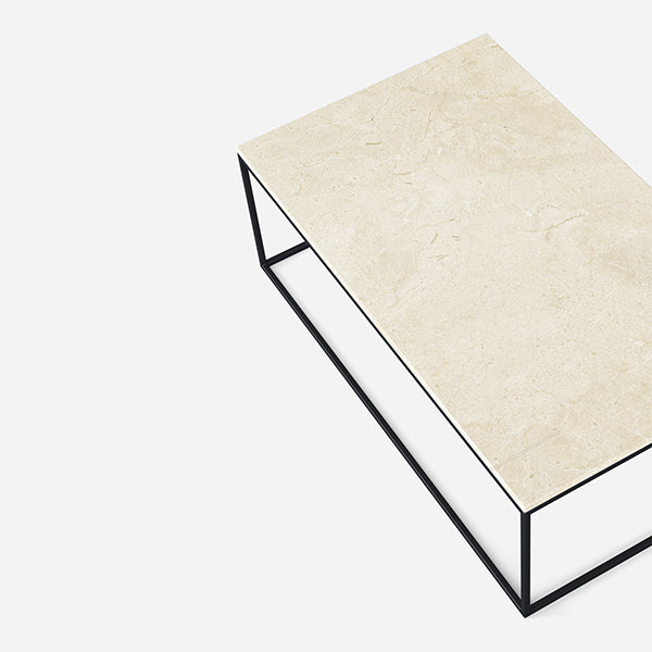 Glossy rectangular marble coffee table in Crema Marfil beige with a sleek design, perfect for modern living rooms.