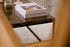 Dark Emperador brown marble rectangular coffee table with a glossy finish, featuring a sleek modern design.