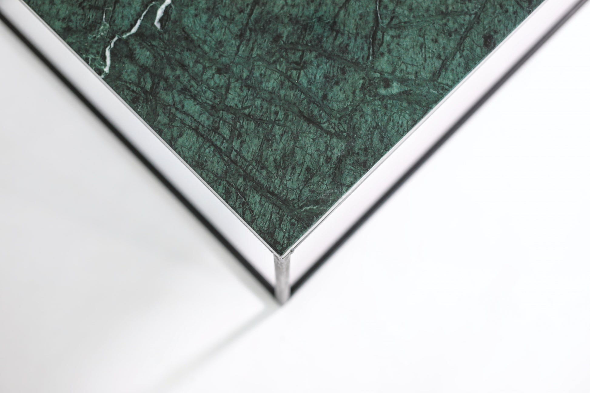 Rectangular India Green marble coffee table with glossy finish, featuring a sleek design and sturdy construction.