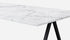 Glossy rectangular marble dining table in Bianco Carrara White with V-frame design, ideal for elegant dining spaces.