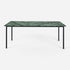 Glossy rectangular marble dining table in India Green with four legs, ideal for modern dining spaces.