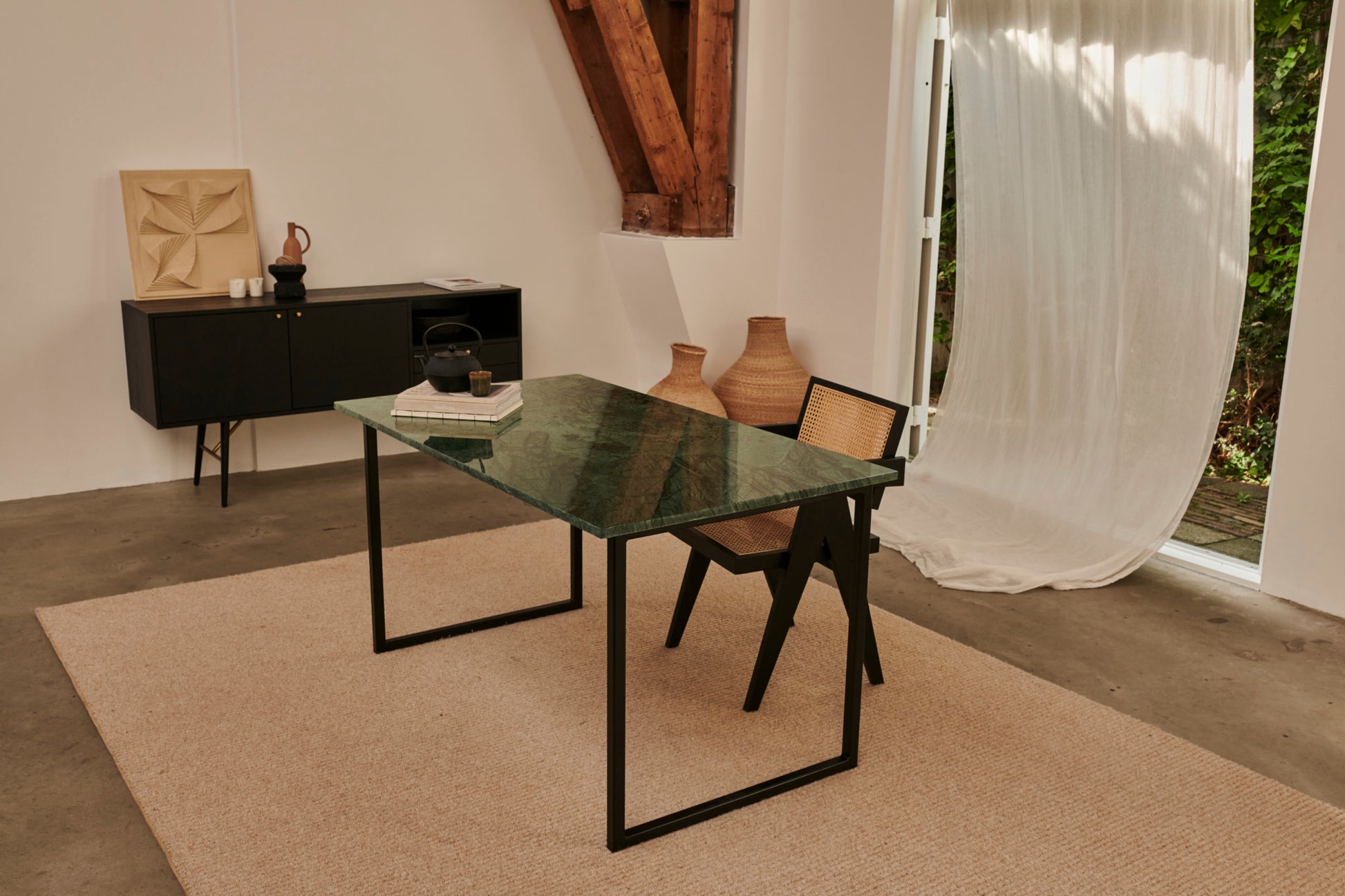 Glossy rectangular India Green marble dining table with V-frame base, ideal for modern dining spaces.