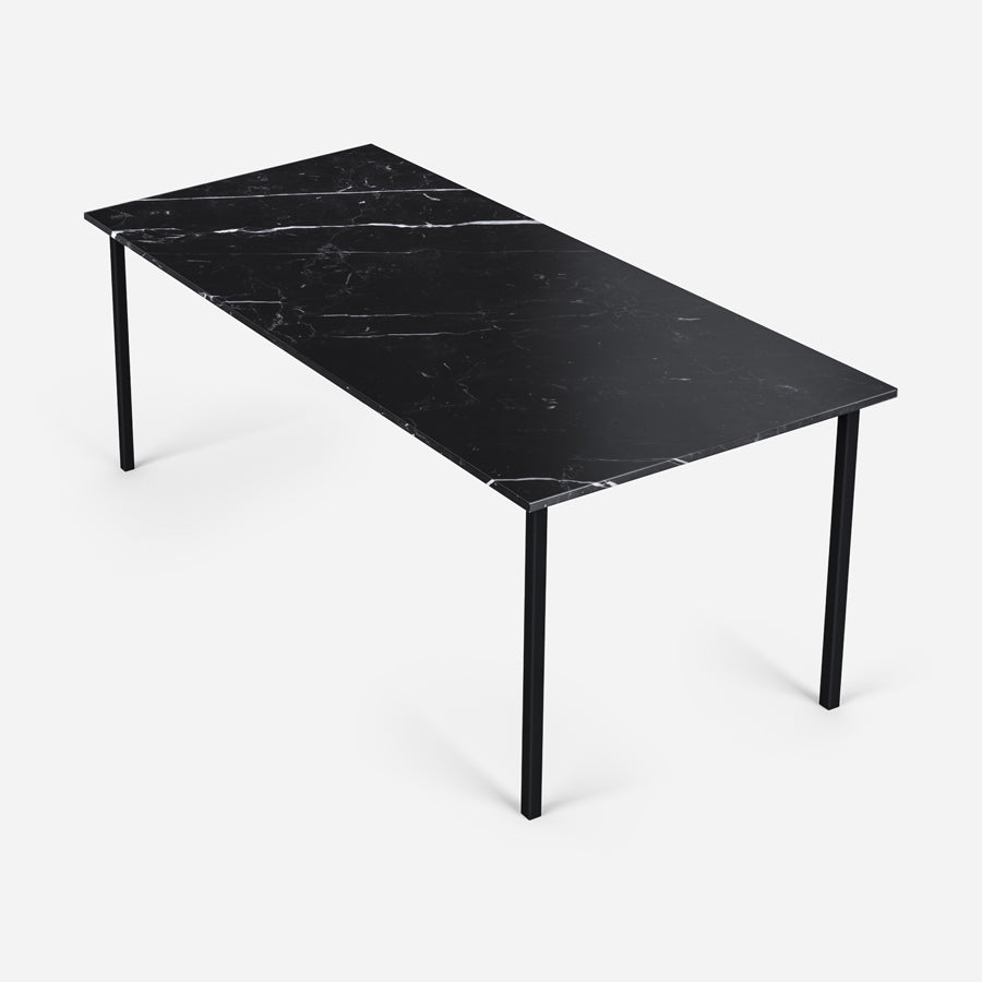 Rectangular Nero Marquina black marble dining table with four legs, glossy finish, and modern design.