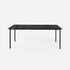Rectangular Nero Marquina black marble dining table with four legs, glossy finish, 140x80 cm, modern design for dining room.