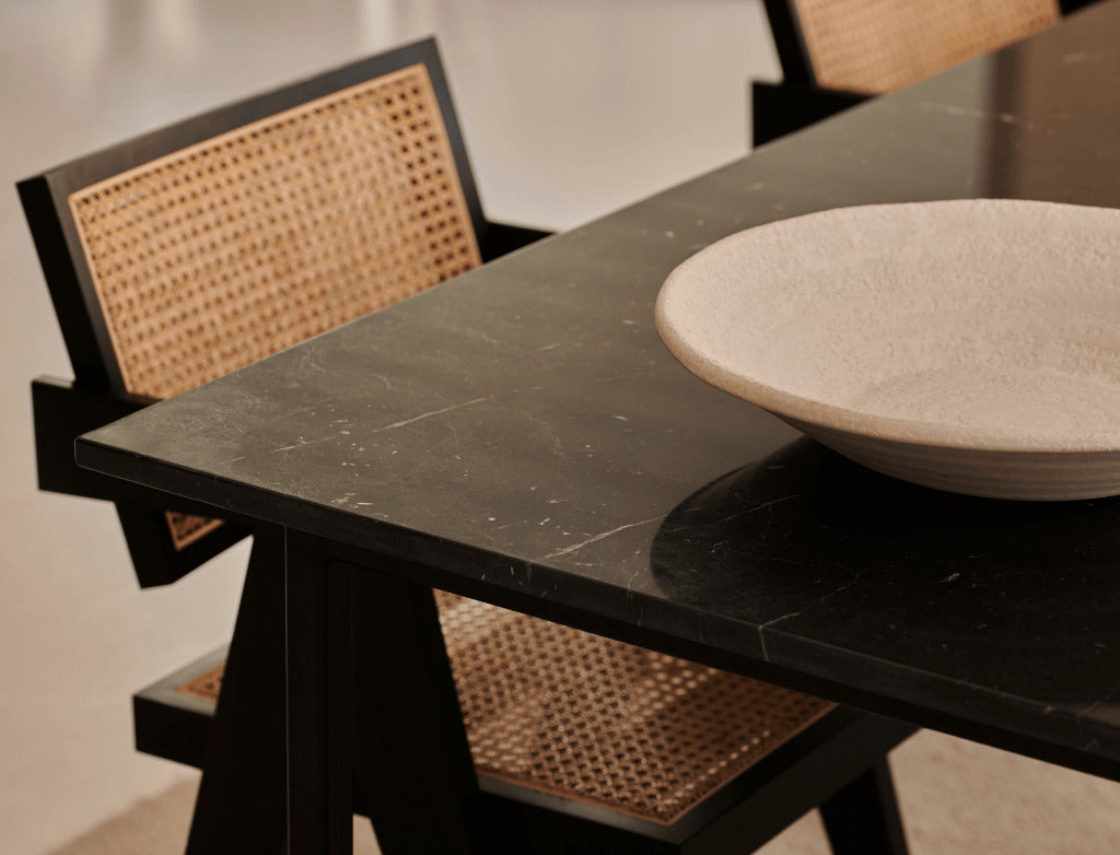 Rectangular Nero Marquina black marble dining table with four legs, glossy finish, ideal for modern dining rooms.