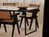 Marble dining table with travertine surface and U-frame base, rectangular shape, modern design ideal for dining rooms.