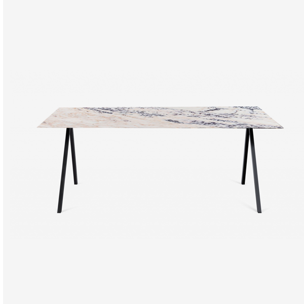 Rectangular marble dining table with glossy surface and V-frame legs, featuring Amarante Viola marble in a modern dining room setting.