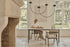 Rectangular Crema Altea marble dining table with four legs, glossy finish, ideal for modern dining spaces.