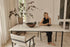 Rectangular Crema Altea marble dining table with four legs, glossy finish, ideal for modern dining rooms.