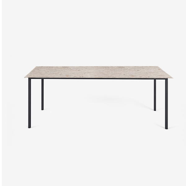 Glossy rectangular marble dining table with Crema Altea finish and four legs, designed for elegant modern dining spaces.
