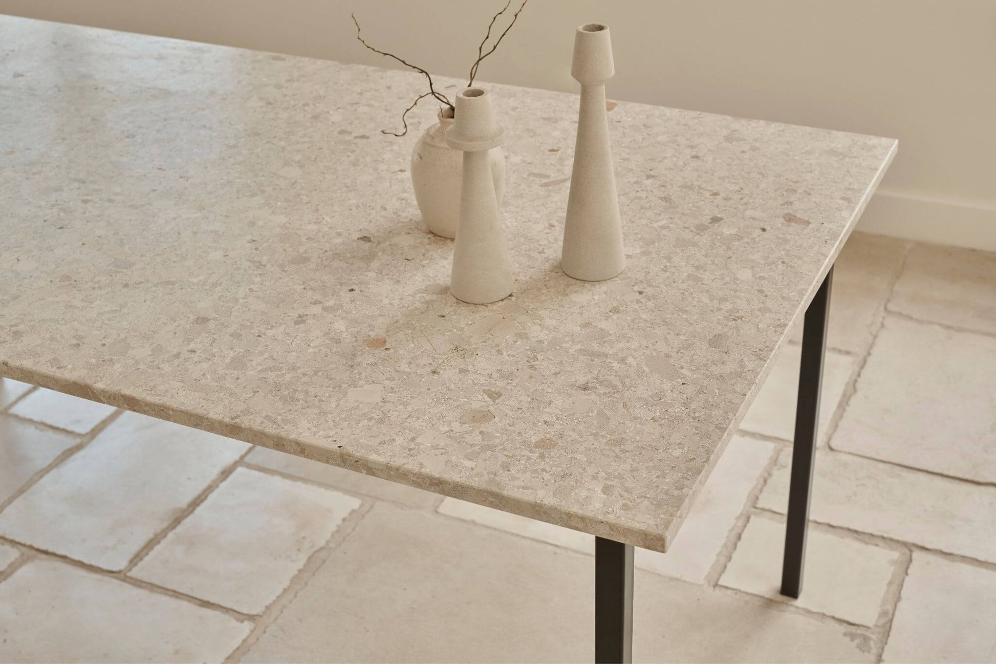 Glossy rectangular marble dining table in Crema Altea with V-frame design, ideal for modern dining spaces.