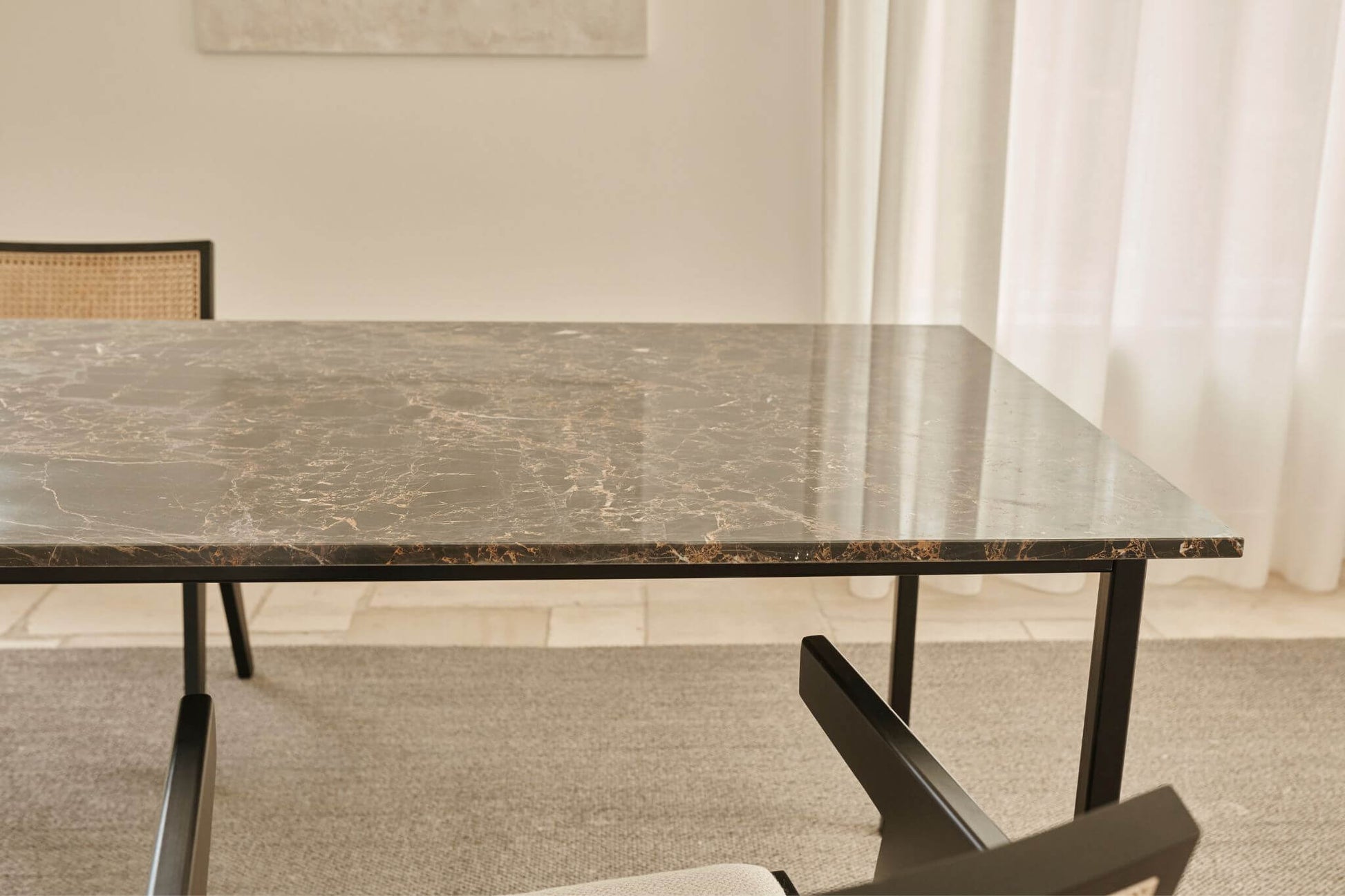 Glossy rectangular Portoro marble dining table with four legs, ideal for modern dining rooms.