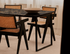 Glossy rectangular Portoro marble dining table with V-frame legs, 140x90 cm, modern and elegant design.