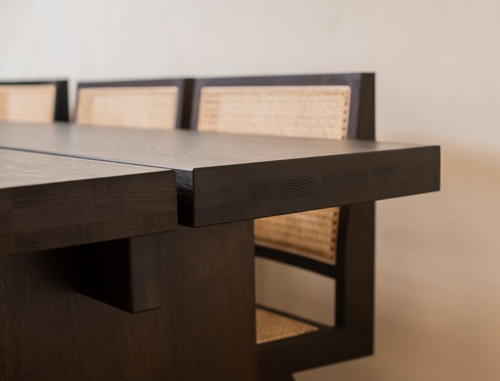 Rectangular dining table in natural oak with a 160cm length and 80cm width, featuring a sleek, modern design.