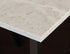 Rectangular Bianco Carrara White marble dining table with four legs, matte finish, dent in the middle, designed for modern dining spaces