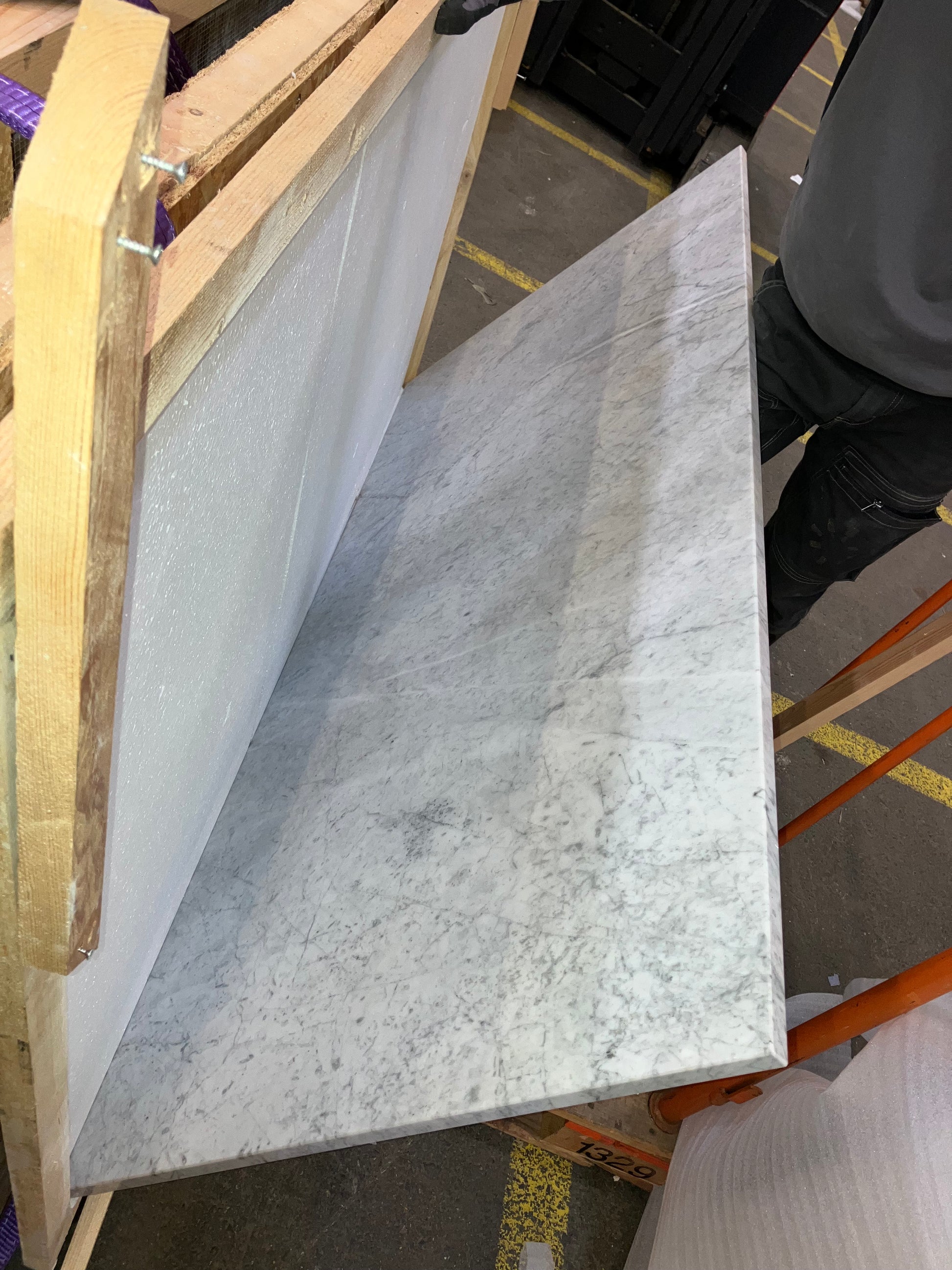 Rectangular marble dining table with Bianco Carrara white surface and four legs, matte finish with scratch detail, 160x80cm.