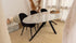 Oval marble dining table with Bianco Carrara white marble top and arch metal frame, glossy finish, 160x90 cm size.