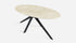 Glossy oval marble dining table in Crema Marfil beige with arch metal frame, modern design, perfect for elegant dining spaces.