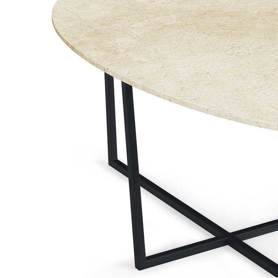 Glossy oval marble dining table with Crema Marfil beige surface and cross-frame design, ideal for elegant dining spaces.
