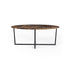 Dark Emperador brown oval marble dining table with a cross-frame base, glossy finish, ideal for modern dining spaces.