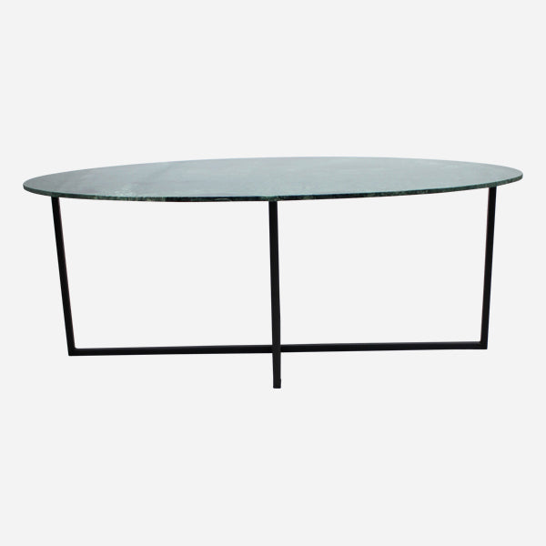 Glossy oval marble dining table with India Green marble top and cross-frame base, modern and elegant design.