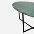 Oval marble dining table with India Green marble top and cross-frame base, glossy finish, ideal for modern dining spaces.