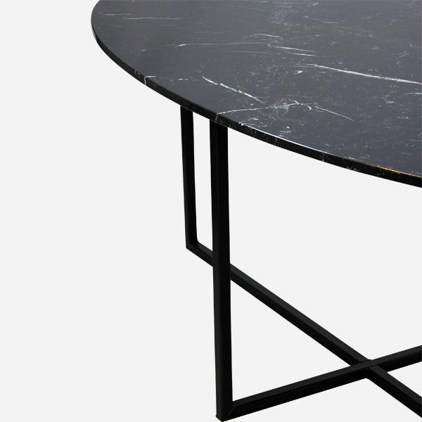 Glossy oval marble dining table with Nero Marquina black marble top and cross-frame base, ideal for modern dining rooms.