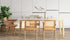 Rectangular marble dining table with Bianco Carrara white surface and wooden frame, glossy finish, ideal for modern dining rooms.