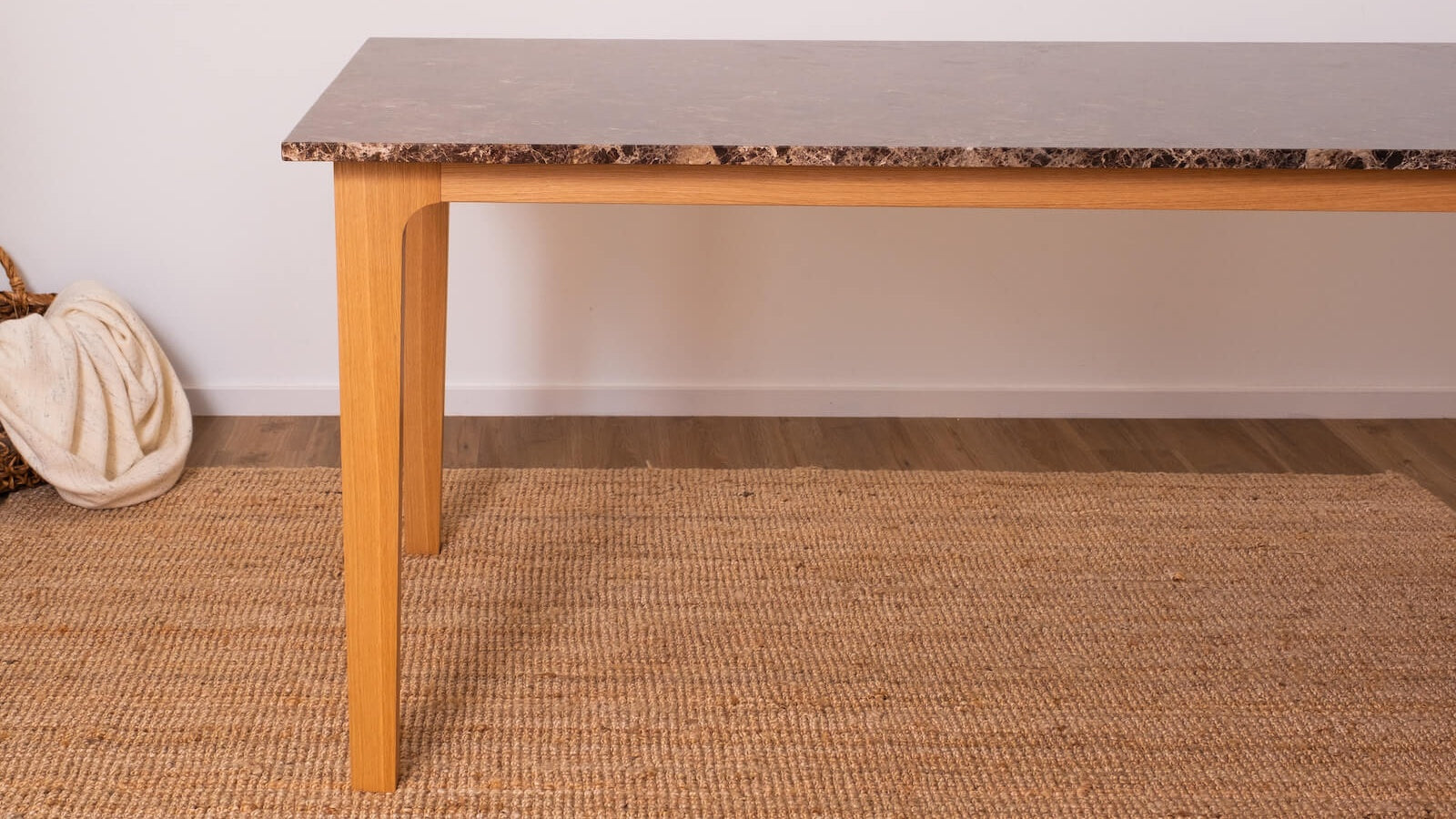 Rectangular marble dining table with dark Emperador brown marble surface and wooden frame, perfect for modern dining rooms.