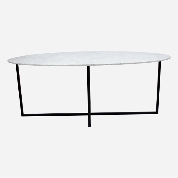 Oval Bianco Carrara marble dining table with cross-frame base, matte grey finish, showing small scratches, size 160x100 cm.