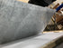 Rectangular Bianco Carrara white marble dining table with four legs, matte finish, minor scratches, 160x90 cm, by My Store.