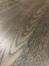 FRANKY rectangular dining table in black oak finish with minor scratches and chipped corners, measuring 180x90 cm.