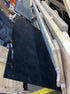 Rectangular Nero Marquina black marble dining table with U-frame, matte finish, showing light scratches and damaged edges.